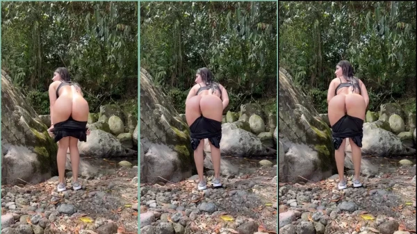 Xiomara Echavaria en un video haciendo un ensayo sensual en la cascada